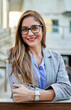 © Cavan Images - Portrait of a young businesswoman
