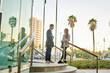 © Cavan Images - Business people talking. Corporate communication