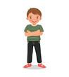 © Tenstudio - cute little boy standing with arms crossed pose