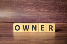 Ownership Wooden Cubes With Letters, Legal Property Possession Concept,