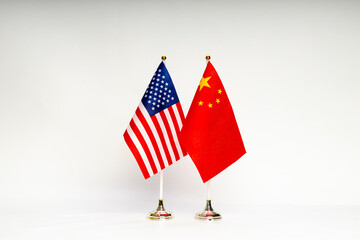 State flags of the USA and China on a light background.