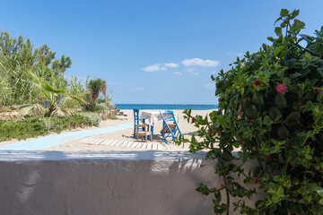 Wall Mural - View from the terrace of a small Taverna on Missiria beach near Rethymno, Crete, Greece