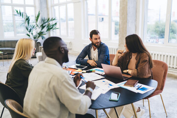 Sticker - Group of coworkers working on project in office