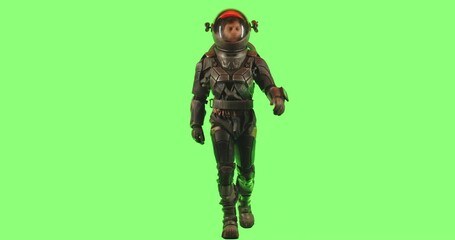 Wall Mural - chroma key side view of male astronaut wearing a spacesuit walking against green screen