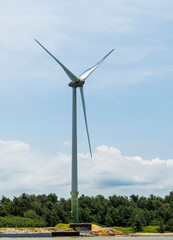 Wall Mural - Close-up of wind power systems with blue sky background on the west coast of Taiwan.