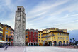 Riva del Garda, Italy. Old town and medieval tower Torre Apponale early in the morning.