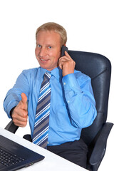 Wall Mural - gesture series: businessman gets positive message by cell phone. thumbs up.