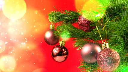 christmas background. christmas tree with shiny decorations on the red background with bokeh lights.