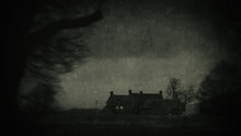 A Spooky, Farm House With Glowing Windows In The Countryside. On An Atmospheric Winters Evening. With An Old, Grunge Edit.