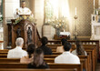 © David L/peopleimages.com - Priest, pastor and spiritual man in church sermon, prayer and speech to catholic people, worship and bible reading, praying or service. Christian preacher man, holy gospel and God, religion and faith