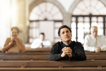 Wall Mural - Church, prayer and man faith, religion or hope for spiritual healing, help and talking to god thinking of life problem. Christian group people praying in holy community for worship, love and support