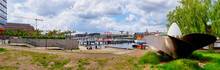 Panorama Of Kiel With QE2 Propeller And View To The Harbor With Bridge And Ships