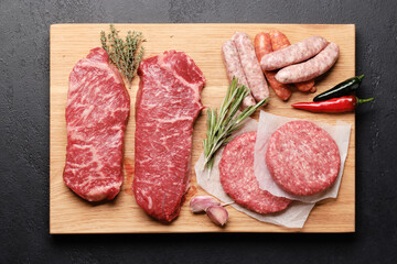 Wall Mural - Various raw meat. Steaks, sausages, burgers and spices