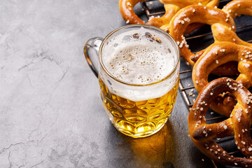 Canvas Print - Freshly baked homemade pretzels and draft beer