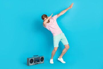 Sticker - Full body photo of attractive young man tape recorder cool dancer modern dance wear trendy pink garment isolated on cyan color background