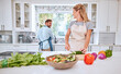 Cooking, happy and couple with vegetables and salad in a home kitchen with love and bonding. Healthy, diet and food nutrition of a wife and man together in a house with happiness from marriage