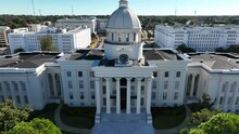 State Capitol Building In Alabama. USA And AL Flags And Government Buildings In Deep South. Home To American Confederacy. American Civil War Theme.
