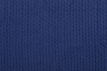 Wall Mural - Blue knitting fabric textured background