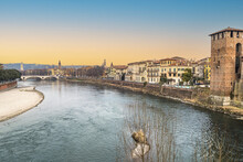 The Adige River And The Panorama Of Verona Seen From The Castelvecchio Bridge At Sunset
