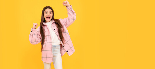 Poster - concept of success. autumn fashion. happy teen girl in pink checkered shirt. kid casual style. Child face, horizontal poster, teenager girl isolated portrait, banner with copy space.