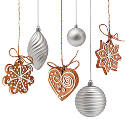 Wall Mural - christmas gingerbread cookies and silver glass decoration hanging isolated