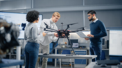 Poster - Diverse and Intelligent Science Specialists Looking at Prototype of the Drone and Talking About It in Scientific Laboratory. Aviation Engineering and Breakthrough in Aviation Technologies Concept.