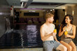 © BGStock72 - Young couple relaxing and drinking fresh orange juice on the poolside