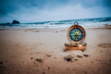 This Abandoned Compass On The Sand Beach Symbolizes The Exploration Of Sailors All Around The World. It Suggests A Direction For A Vacation Or A Life Problem.