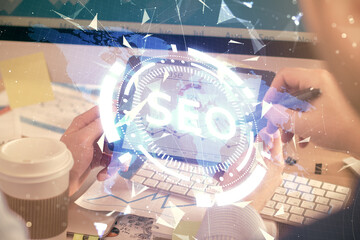 Poster - Multi exposure of man's hands holding and using a digital device and seo drawing. search optimization concept.