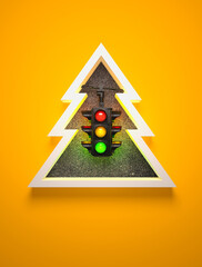 Wall Mural - Creative New Year design template with a traffic light and a symbolic Christmas tree.