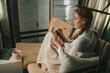 © Strelciuc - Cute lady with eyes patches at home writing notes on a diary while relaxing taking a break, enjoying home lifestyle. Resting, vacation, beauty treatment