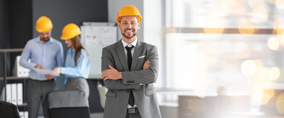 Wall Mural - Portrait of male engineer in office. Banner for design