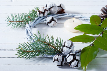 Wall Mural - Christmas wreath on white wood table