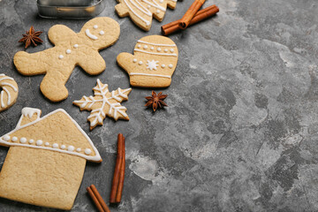 Wall Mural - Tasty Christmas cookies and spices on grunge background