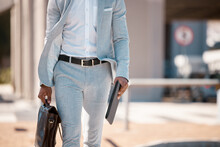 Businessman, Walking To Work And With Briefcase In City With Tablet In Hands Traveling, Outdoor Stroll And Work In Town. Professional Employee, Walk Cityscape Street And Man In Gray Suit In Sunshine