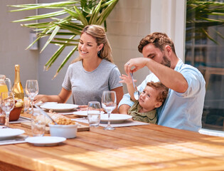 Canvas Print - Food, mother and father with baby at table at an outdoor patio for holiday celebration with champagne and lunch in summer. Happy family, mom and dad with child fine dining together at home or house