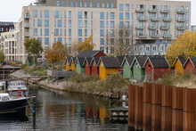 Copenhagen, Denmark Small Boats Houses In A Modern Residential Building Complex In The Sydhavn Or South Harbor Distrct.