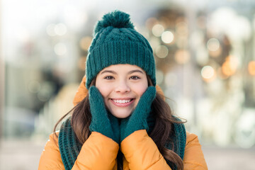 Poster - Portrait of cute cheerful person hands cheeks toothy smile look camera enjoy free time outdoors