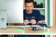 © Marc Calleja - Filmmaker in his home office with his drone on his desk