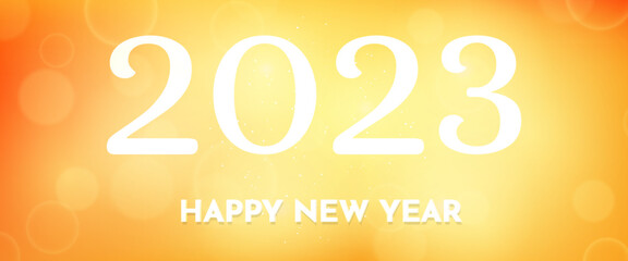 Happy new year 2023 incription on blurred background