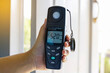 © Aoy_Charin - Light meter, Lux Light Meter hold in hand to measure the brightness of work light and every environment. soft and selective focus.