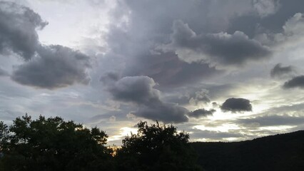 Wall Mural - Ciel nuageux en soirée dans les Cévennes, Occitanie