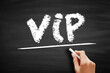 VIP Very Important Person - person who is accorded special privileges due to their high social status, influence or importance, acronym text on blackboard