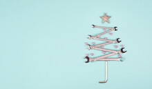 Christmas Tree Made With Wrenches, Baubels And  A Star, New Year Greeting Card With Repair Tools
