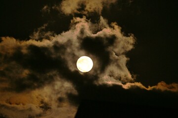 Sticker - A view of the full moon and clouds. Background image of the moon.