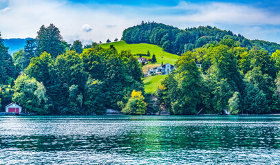 Wall Mural - Houses Boathouse Green Meadows Lucerne Switzerland