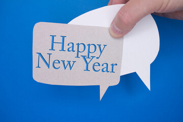 Poster - Speech bubble in front of colored background with Happy New Year text.