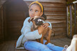 © S Fanti/peopleimages.com - Girl child, animal shelter and dog hug, love and care while thinking about adoption. Pet, charity and kid hugging, embrace or cuddle with foster puppy, bonding and contemplating support for animal.