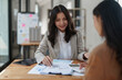 © itchaznong - Group of business consultant working management big data and analyze financial document of company. account, finance, business concept