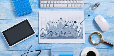 Sticker - Digital tablet with a growth graph on paper with a business objects.